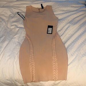 Brand new Marciano dress. Tan couple mini dress.